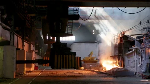 Loading of ore in the open-hearth furnace at a metallurgical plant Stock Footage 304818006