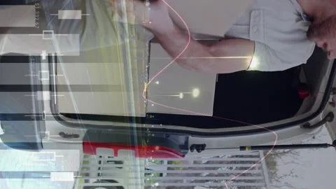 Loading packages in a van 4k Stock Footage 312436405