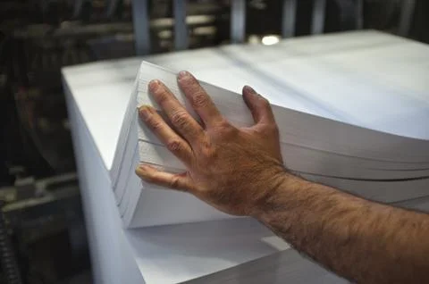 Loading of paper operation Stock Photos