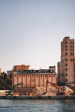 Loading point of building materials on the shore of the bosphorus. loader i.. Stock Photos