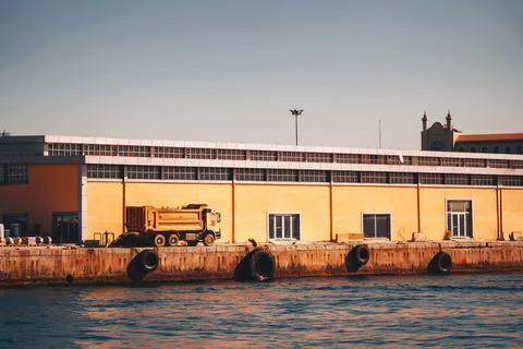 Loading point of building materials on the shore of the bosphorus. truck in.. Stock Photos