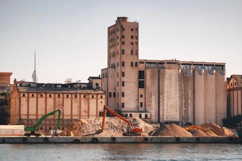 Loading point of building materials on the shore of the bosphorus. loader i.. Stock Photos