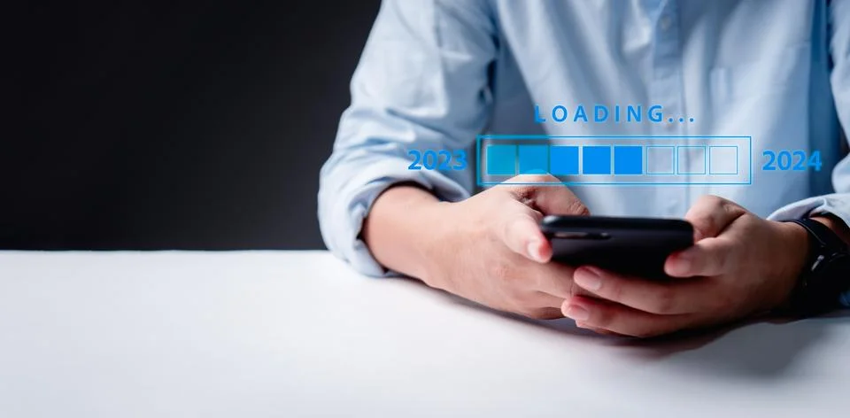 Loading progress bar fills up, symbolizing the transition from 2023 to 2024.. Stock Photos