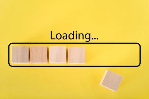 Loading the progress bar with wooden cubes. Download progress. Loading status Stock Photos