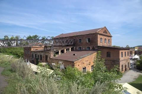 Loading ramp and old buildings of the metallurgical plant. Sysert Stock Photos