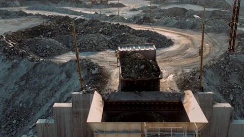 Loading rock in dumper. Loading coal into truck. Mining car machinery to transpo Stock Footage 158505912