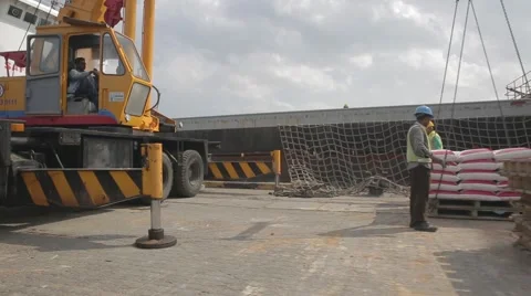 Loading Sacks On Ship By Crane Stock Footage 65309196