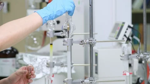 Loading sample on the surface of silica gel in column Stock Footage 129830377