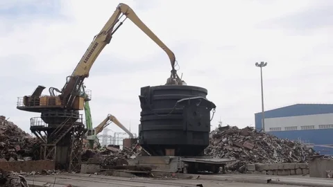 Loading scrap metal into the melting pot general shot Stock Footage 71584731