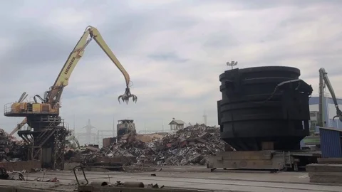 Loading scrap metal into the melting pot Stock Footage 71592525