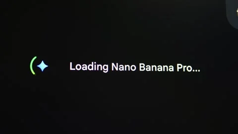 A loading screen on a dark background showing text Loading Nano Banana Pro Stock Footage 321750196