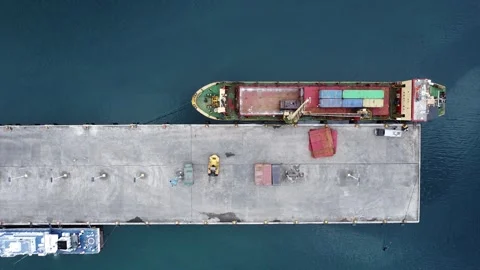 Loading a ship with containers at the port. Sea cargo transportation. Cargo Stock Footage 261404032