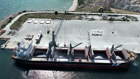 Loading the ship with limestone, gravel and sand. Export the material. Stock Footage 232592436