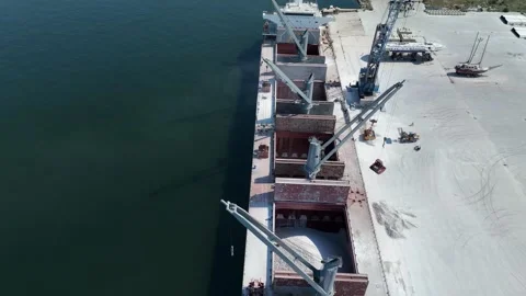 Loading the ship with limestone, gravel and sand. Export the material. Stock Footage 232593567