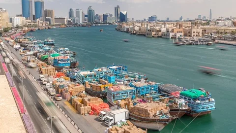 Loading a ship in port timelapse in Dubai, Deira creek, UAE. Stock Footage 119070054