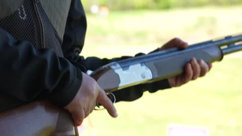 Loading a shot gun Stock Footage 343144705
