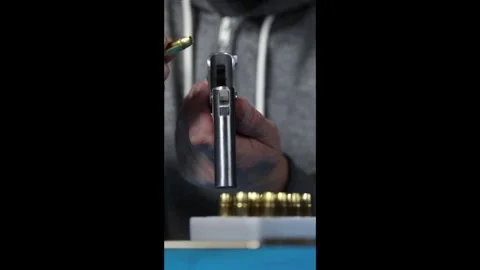 Loading of small personal two barrel derringer handgun of .38 special caliber 스톡 동영상 296551543
