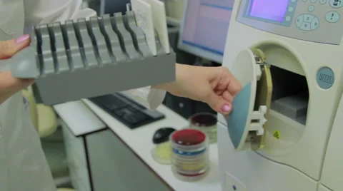 Loading specimen for chemistry test analysis Stock Footage 63299578