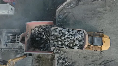 Loading stones into crushing equipment Stock Footage 200826675