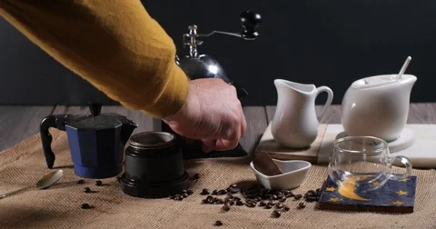 Loading a traditional Italian coffee machine Stock Footage 73526250