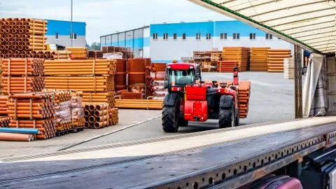 Loading the Truck. Forklift loading a Trailer . Stock Photos