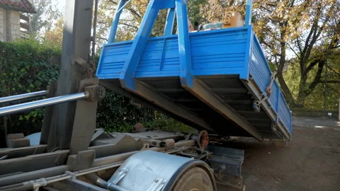 Loading the truck trailer onto the vehicle Stock Footage 148277424