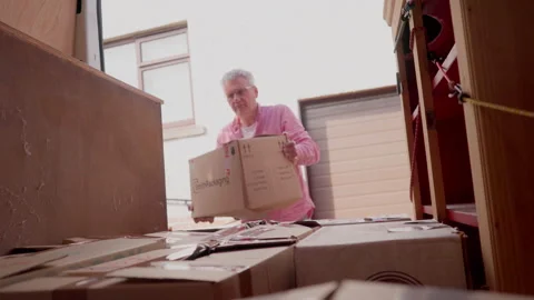 Loading van with cardboard boxes for house move Stock Footage 275174043