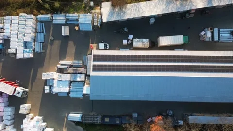 Loading up various parcels in vans and trucks Stock Footage 297696797