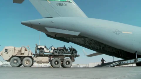 Loading vehicles on the C-17 Globemaster III operations Stock Footage 33249453