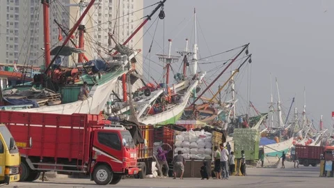 Loading vessel at Sunda Kelapa harbour in Jakarta Java Indonesia Stock Footage 81911371
