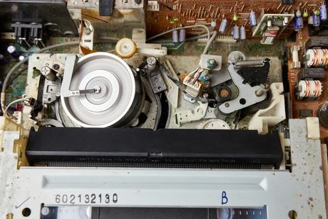 Loading a VHS tape and the operation of the tape extension mechanism of the.. Stock Photos