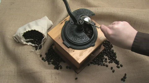 Loading A Vintage Manual Coffee Grinder Stock Footage 659858