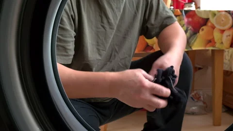 Loading a wash. Stock Footage 146283005