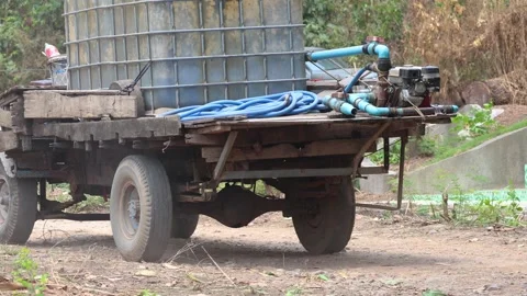 Loading Water Tanks onto Trailer Stock Footage 289187360