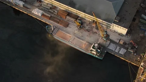 Loading of wheat grain on a bulk carrier at the ship's pier in the port. Stock Footage 141658084