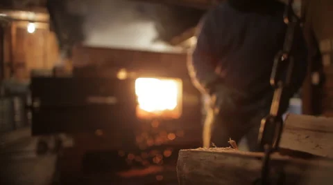 Loading Wood Into Maple Sap Evaporator Stock Footage 5503556