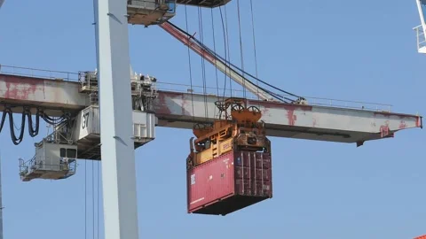 Loading\Unloading container to ship by industrial line gantry crane 4k creative  Stock Footage 139883779