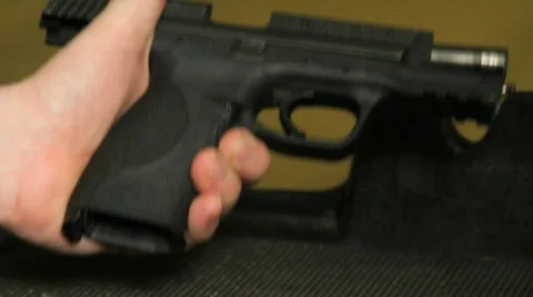 Loading/unloading semi-automatic (multiple shots) Stock Footage 642206