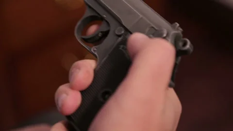 Loads the gun  스톡 동영상 135995483