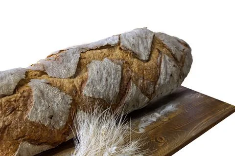 A loaf of artisan bread isolated on a white background Stock Photos