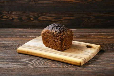 Loaf of artisan rye bread on a table Stock Photos