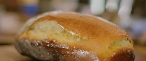 Loaf of baked bread Video stock 105437503