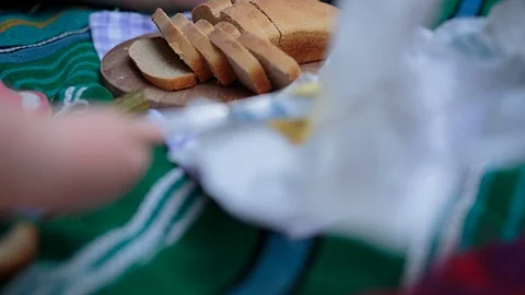 Loaf of bread and butter on the table Video stock 94882773