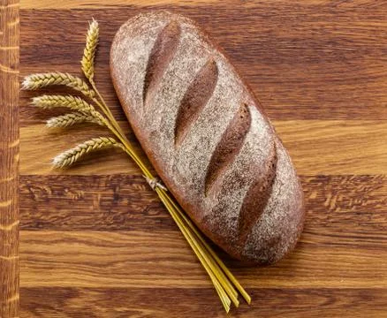 Loaf of bread and rye cones Stock Photos