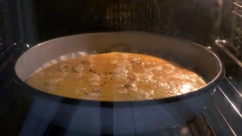 A loaf of bread baked in the oven 스톡 동영상 128716288