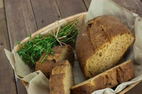 Loaf of bread in a basket Stock Photos