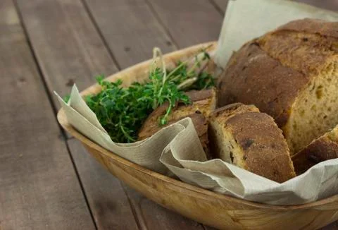 Loaf of bread in a basket Stock Photos