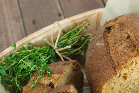 Loaf of bread in a basket Stock Photos