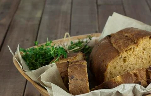 Loaf of bread in a basket Stock Photos