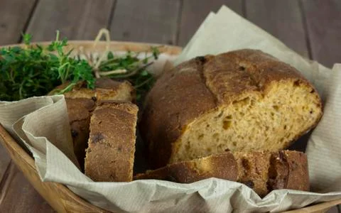 Loaf of bread in a basket Stock Photos
